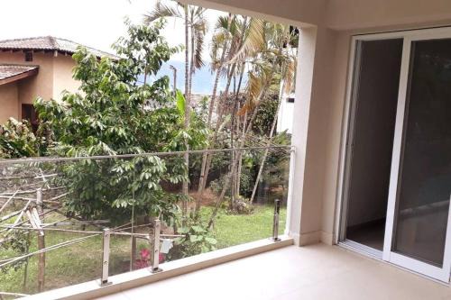 Casa com varanda, ar condicionado pet friendly