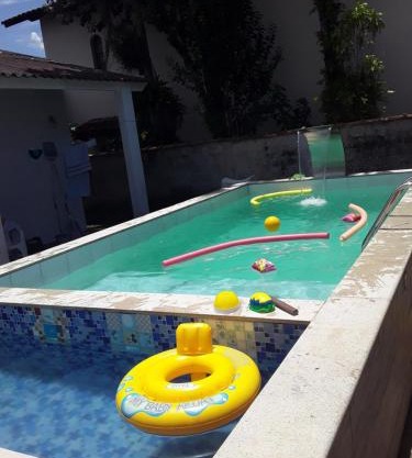 CASA DE PRAIA COM DUAS PISCINAS E GARAGEM