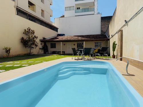 Casa de Praia com Piscina e Churrasqueira a 280m da Praia do Morro - 3 quartos com Ar Condicionado, sendo 2 suítes- Quintal amplo, ideal para famílias