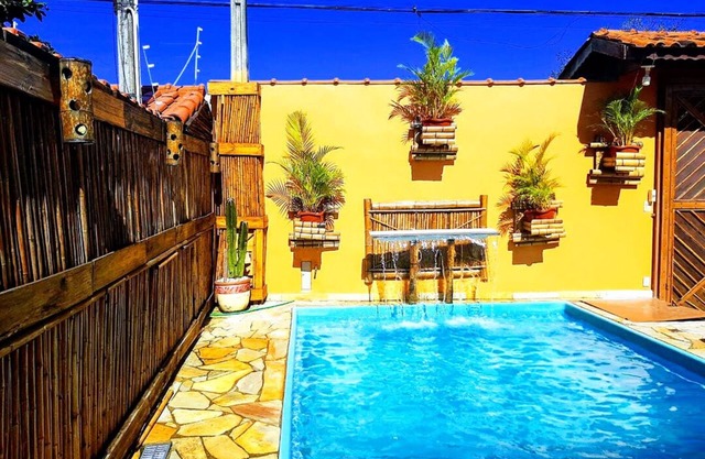 Casa linda com Piscina e Jogos, pertinho da Praia