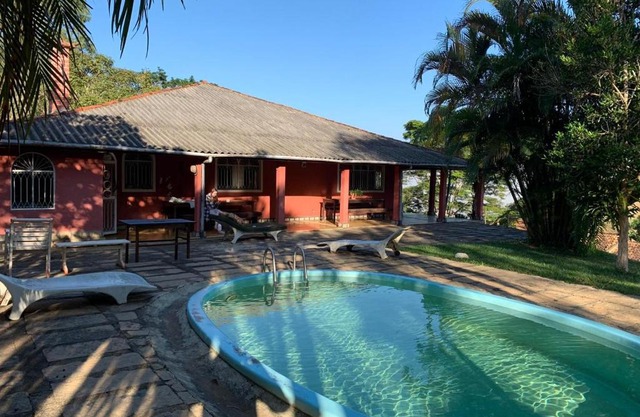 Casa na serra com cachoeira