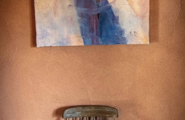 Casita de Colores secluded 2 story adobe amidst serene pine and ponderosa trees.