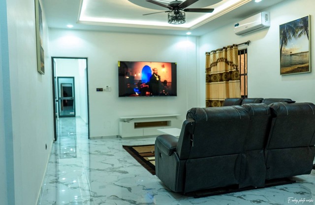 Charming 2-bedroom apartment with AC, WiFi along with security agent in Lome.