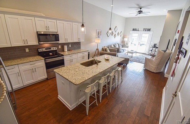 Charming 2BR/2BA condo in Downtown Tuscaloosa with gated parking.