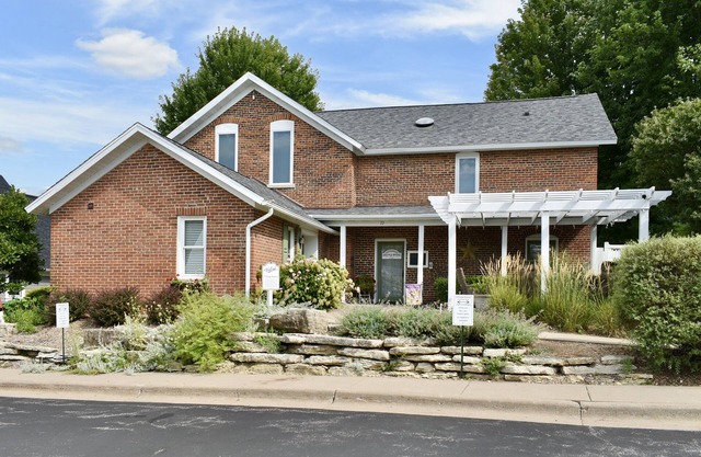 Charming Brick Farmhouse with a Touch of Elegance. -Winona