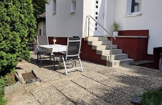 Charming house within a house - vacation & business apartment with private terrace.
