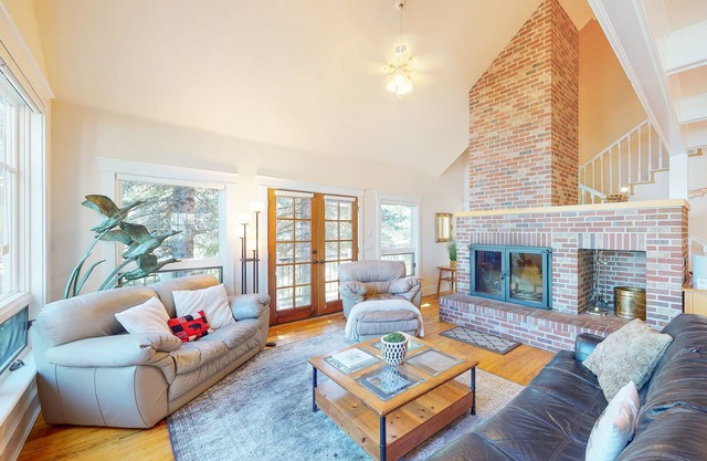 Charming lakefront home with private dock, patio, fireplace, & WiFi