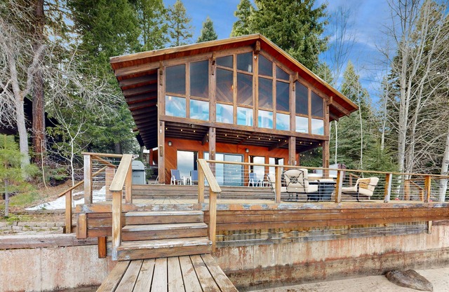 Charming lakefront home & cottage with a deck, hot tub, & washer/dryer