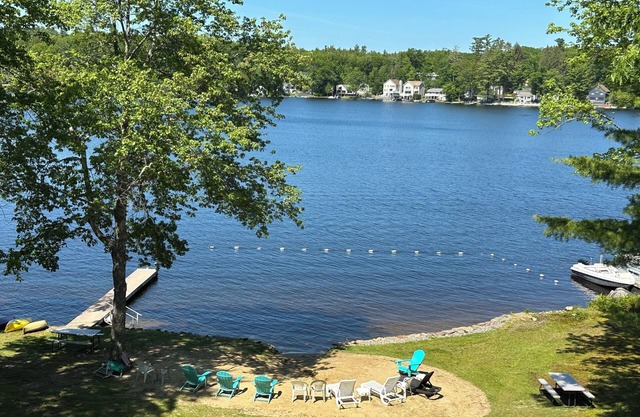 Charming lakeside cottage steps away from private sandy beach. Summer weeks open
