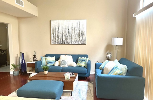 Charming single story home in gated community with community pool and lagoon.