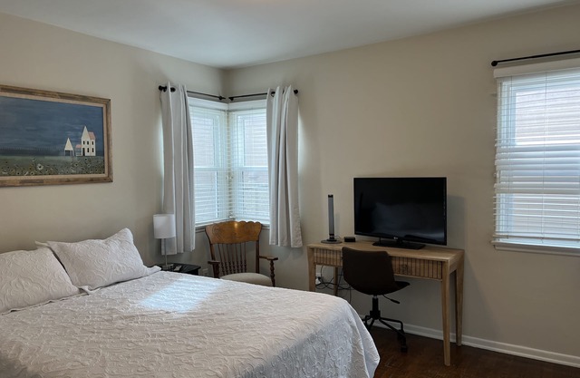 Charming, Well Appointed Suburban Bungalow with Grassy Yard