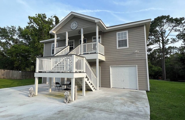 Coast home on bayou. Clean, family-sized, and close to everything!