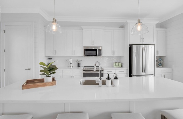 Coastal beach cottage steps away from the white sand beaches!