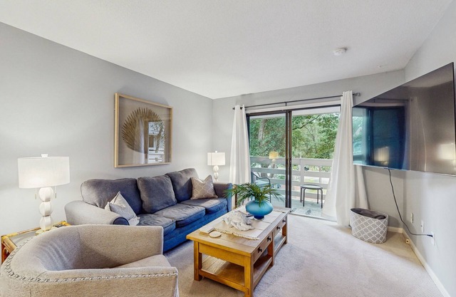 Coastal condo with private balcony, pickle ball, tennis, pools, close to beach