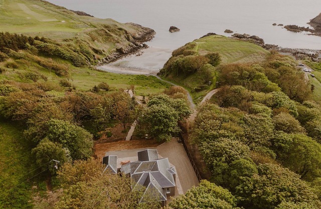 Coastal Magnificence: Saltwater Chronicles with private sea view deck.