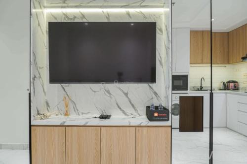 Comfortable and Simply 1BR at The Boulevard Apartment By Travelio