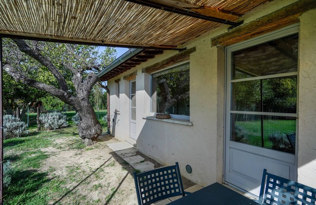 Comfortable apartment in Asciano, A/C,Wi-Fi, ground floor with garden