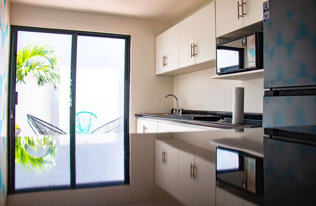 Comfortable modern apartment conveniently located for shopping and dining.