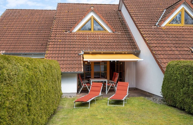 Comfortable terraced house in Zingst with terrace, garden and heated indoor pool