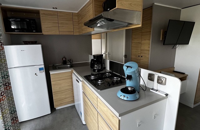 Comfortable wooden cottage with master suite and heated pool