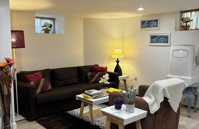 Comfy, cozy and clean basement apt with parking close to Harvard, Tufts and MIT.