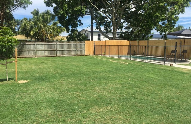 Compact single level home with pool and huge fenced yard