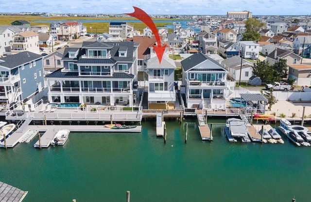 Completely modern renovated bay front with water views. Walk to the beach