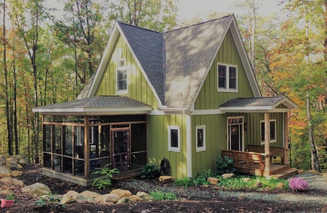 Contemporary rustic home nestled among boulders on 5 wooded acres