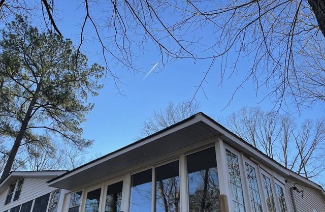 Conveniently located home with large enclosed porch