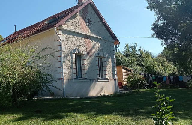 Country house by a stream