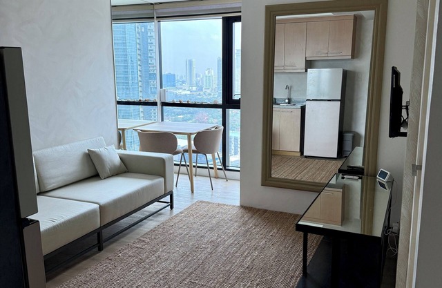 Cozy 1-BDR condo with AC, Hot Water, and WiFi in Brgy Wack-Wack Greenhills