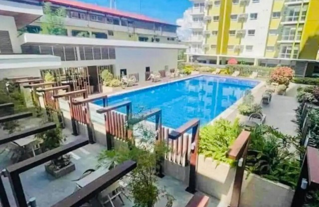 Cozy 1-bedroom condo w/AC, WiFi, fitness room & pool in superb Cagayan de Oro