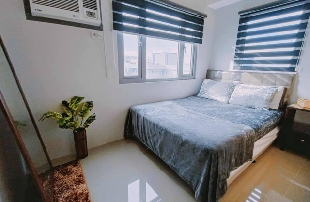 Cozy 1-bedroom condo in terrific Quezon City with AC, WiFi