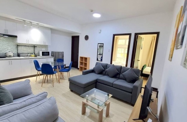 Cozy 2-Bedroom 2-Bath condo San Lorenzo Place Makati WiFi 4KM NAIA