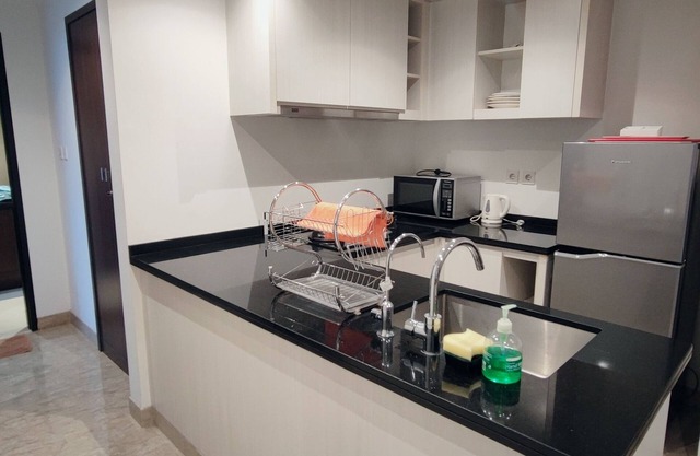 Cozy 2-bedroom apartment in enjoyable Banten with WiFi, fitness room