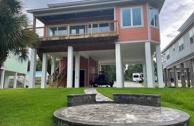 Cozy 4 bedroom 3.5 bath waterfront home with boat dock and slip.