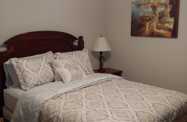 Cozy bedroom with private bathroom, and separate, direct access entrance.