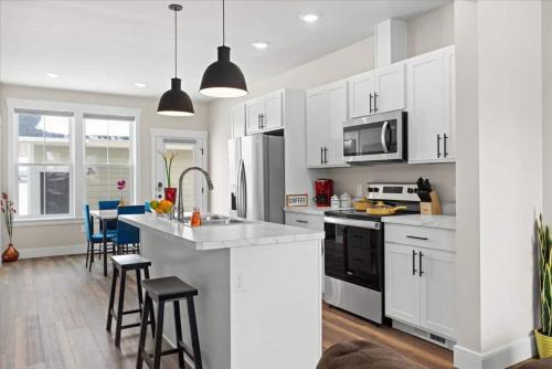 Crash With Class In This Townhome