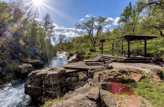 Creekside home and private waterfall on acred estate, near Lassen & Burney.