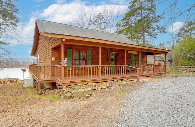 Deck & Fire Pit: Waterfront Cabin in Greers Ferry!