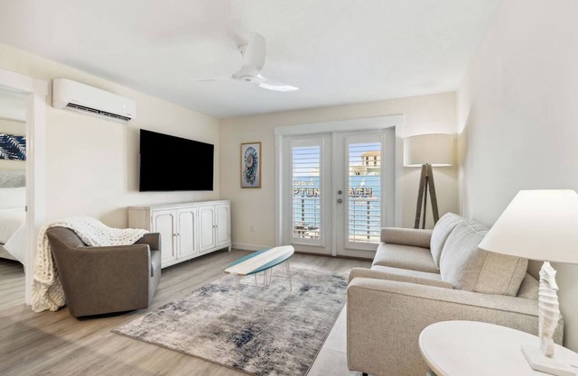 Delight in Ocean Views from Quaint Room in Beautiful Neptune Beach with Pool