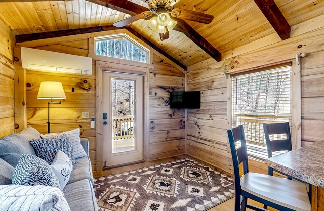 Dog-friendly rustic home with private hot tub, mtn views, wraparound deck, W/D