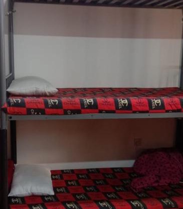 Dormitory bed space in a shared room