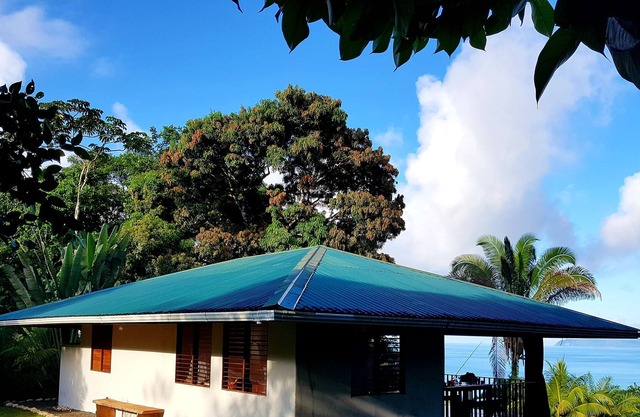 DREAM HOUSE IN THE RAINFOREST BY GERMAN FAMILY