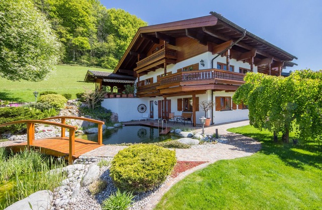 Dream location in Ruhpolding with a terrace by the swimming pond