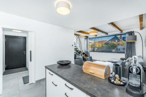 Dvouložnicový mezonetový apartmán se dvěma koupelnami v rodinné vile