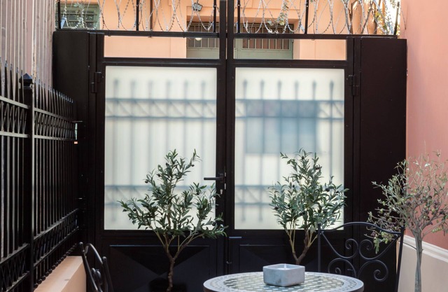 Elaia Athens Boutique themed with the Olive Tree.