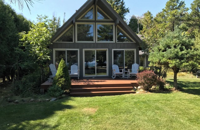 Elegant and spacious Sturgeon Bay getaway with tranquil private beach.