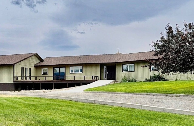 Elevated Elegance with Golf Course Access & Panoramic Valley Views