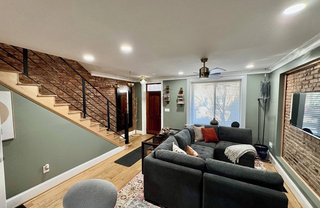 Enchanting 4-bedroom townhome in the heart of DC with decks and amenities!